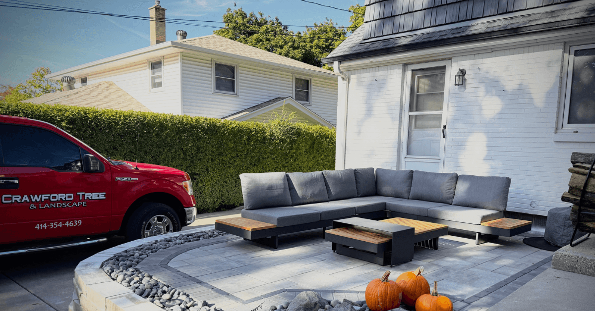 Landscaping: Before and after view of a backyard transformed by Crawford Tree & Landscape services