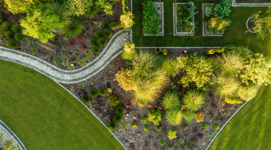 NALP Certified Landscaper designing a sustainable garden bed in Southeast Wisconsin.